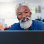 senior-black-man-and-video-call-on-laptop-in-home-2023-12-28-20-59-58-utc-scaled